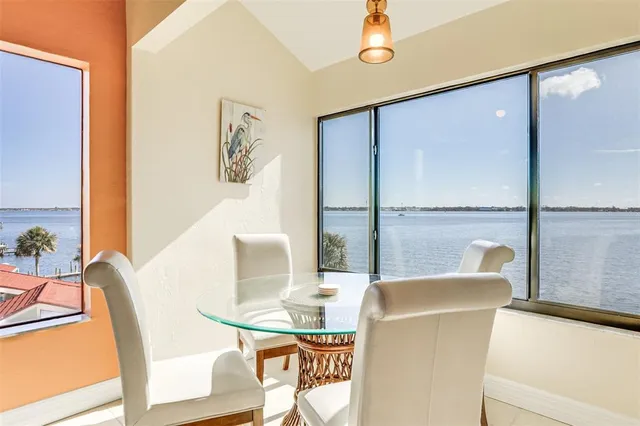 a kitchen with stainless steel appliances a stove a refrigerator and a stove