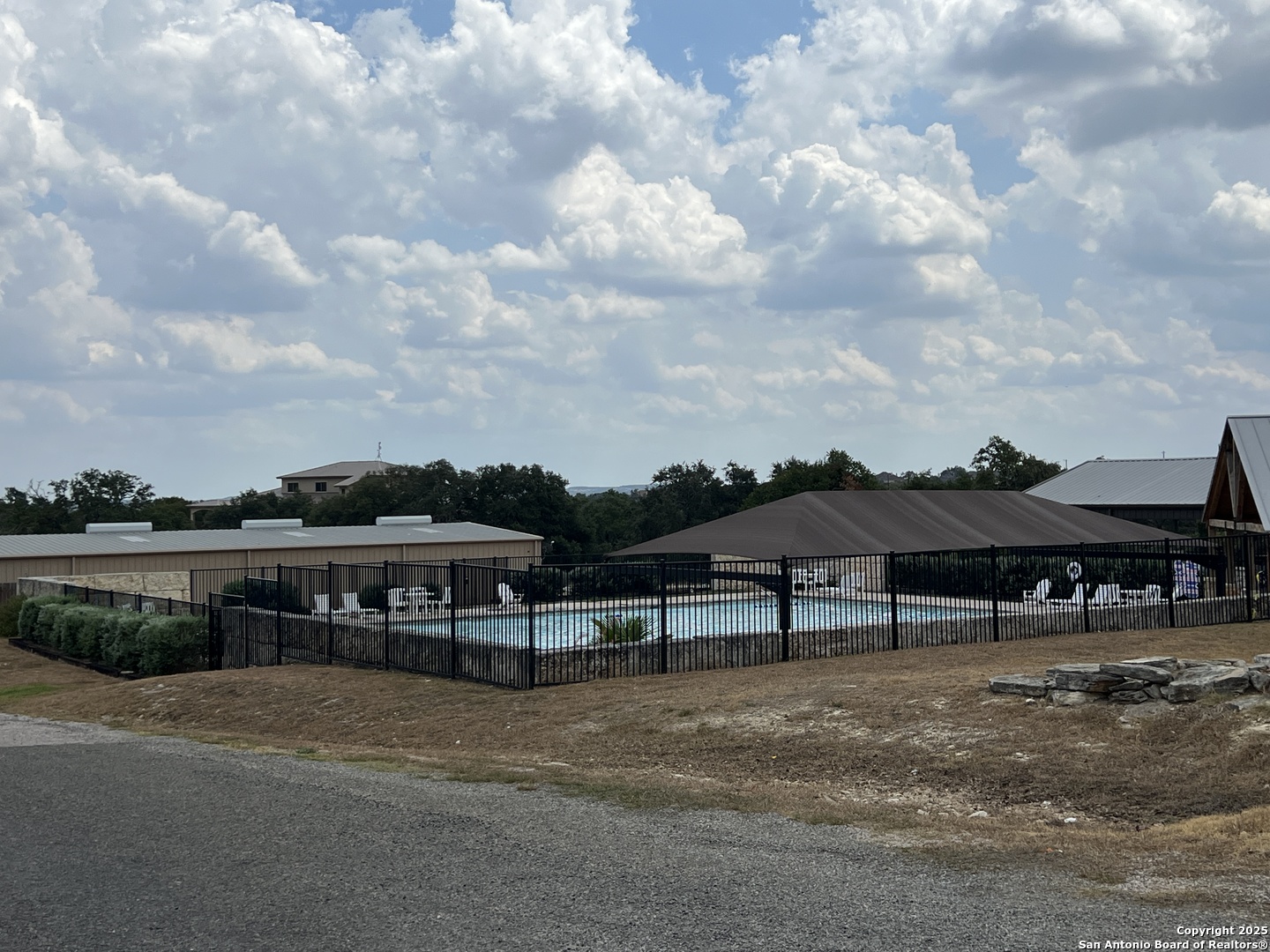 113 Daniel Jackson Blanco, TX 78606 - Photo 9 of 12 a view of houses with outdoor space and lakeside