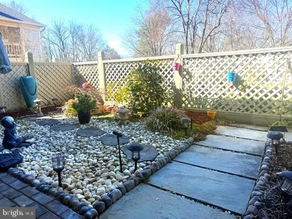 a view of a wooden fence