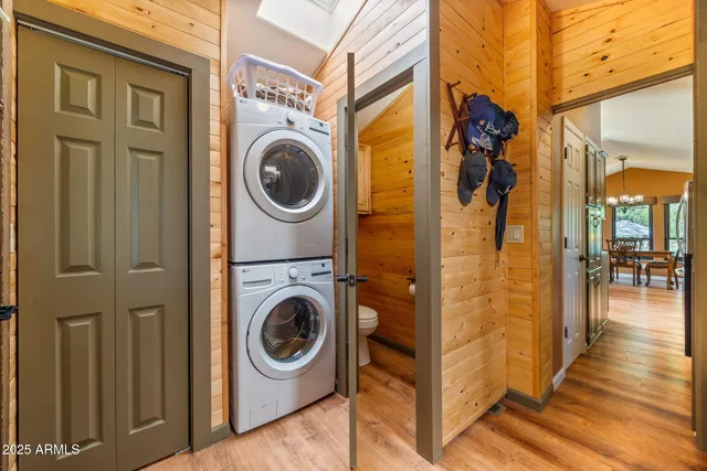 a view of a hallway with washer and dryer