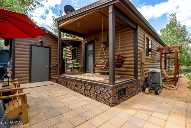 a view of a chairs and table in the patio