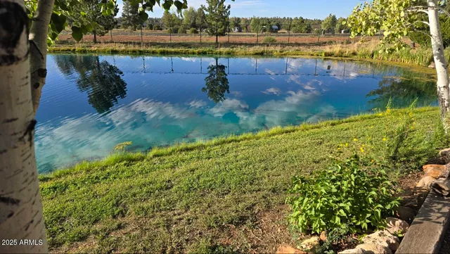a view of a lake with outdoor space