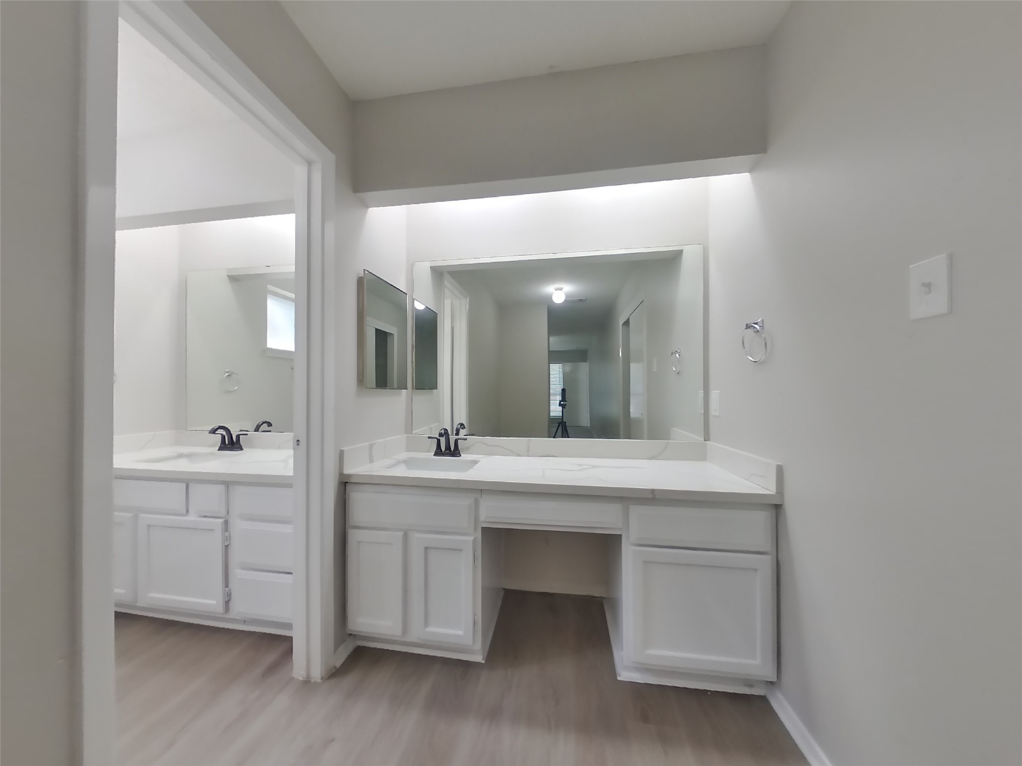 17226 Modbury Drive Spring, TX 77379 - Photo 13 of 20 a spacious bathroom with a double vanity sink and a mirror