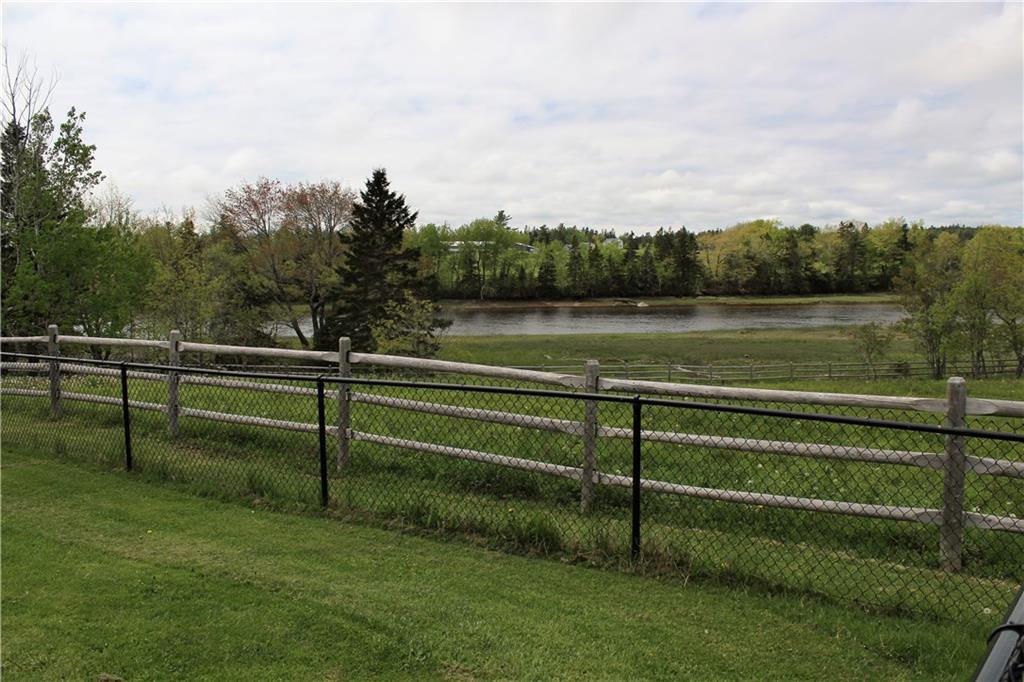 516 Kansas Road Milbridge, ME 04658 - Photo 3 of 34 Tranquil view of the river from back...