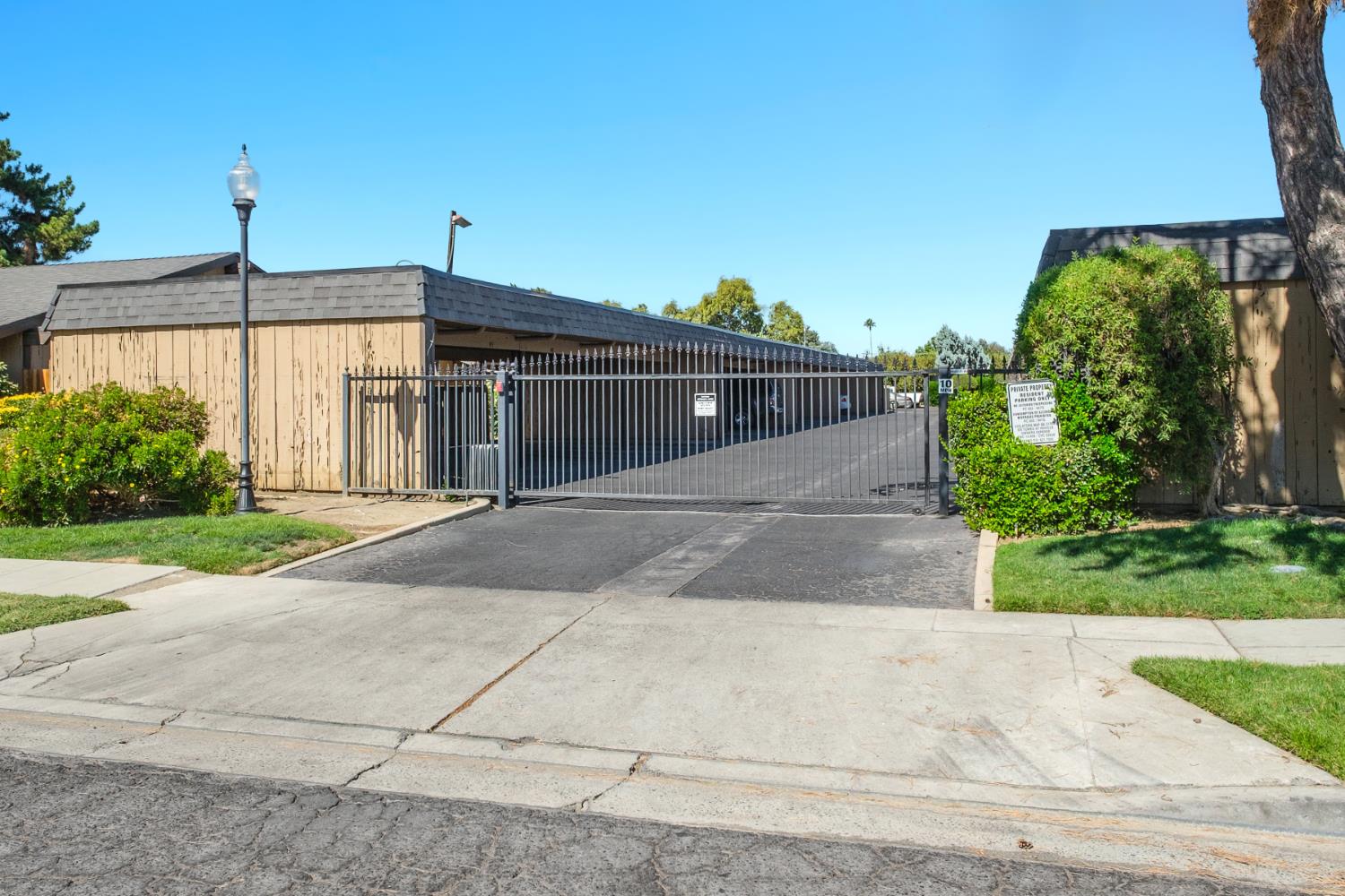 4849 North 7th Street, Unit F Fresno, CA 93726 - Photo 12 of 23 a view of a back yard