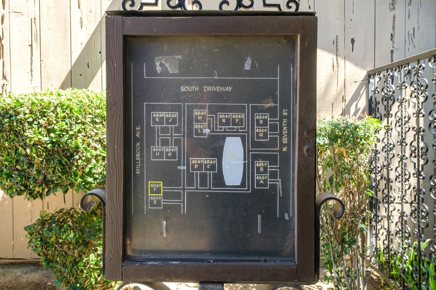 4849 North 7th Street, Unit F Fresno, CA 93726 - Photo 23 of 23 a front view of a house with a tree