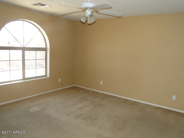 13018 West Hearn Road El Mirage, AZ 85335 - Photo 22 of 31 Master Bedroom