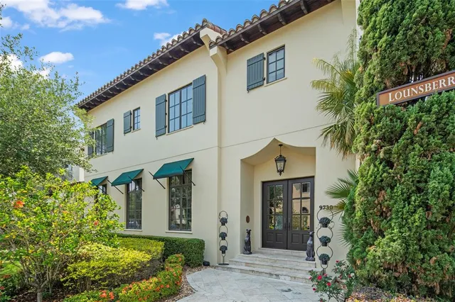 front view of a house with a small yard