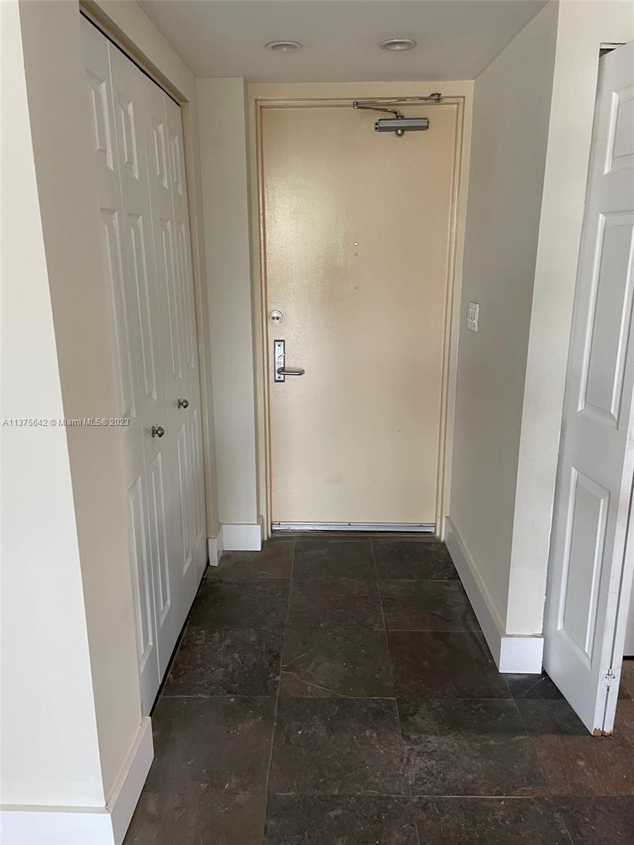 Normandy Beach Surfside, FL 33154 - Photo 18 of 32 a view of a hallway