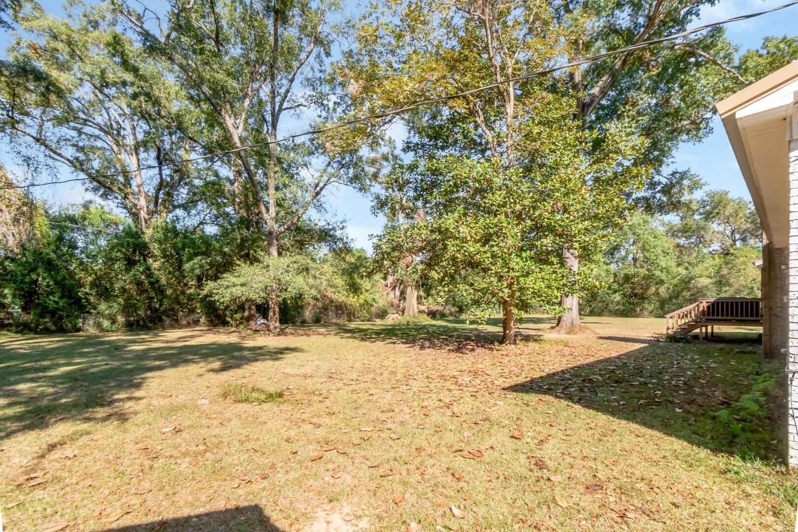 6405 1st Street Wilmer, AL 36587 - Photo 26 of 38 View of grassy yard