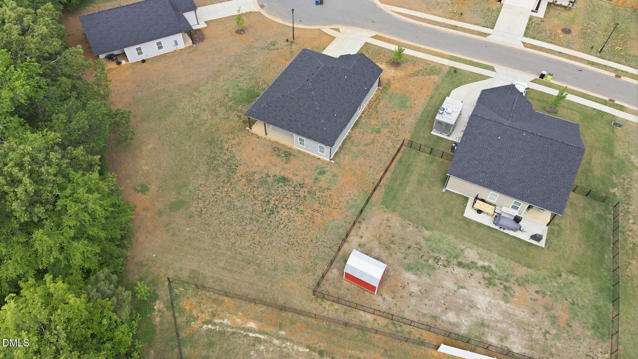 161 Tupelo Dr Spring Spring Hope, NC 27882 - Photo 27 of 28 an aerial view of a house with a yard and garden