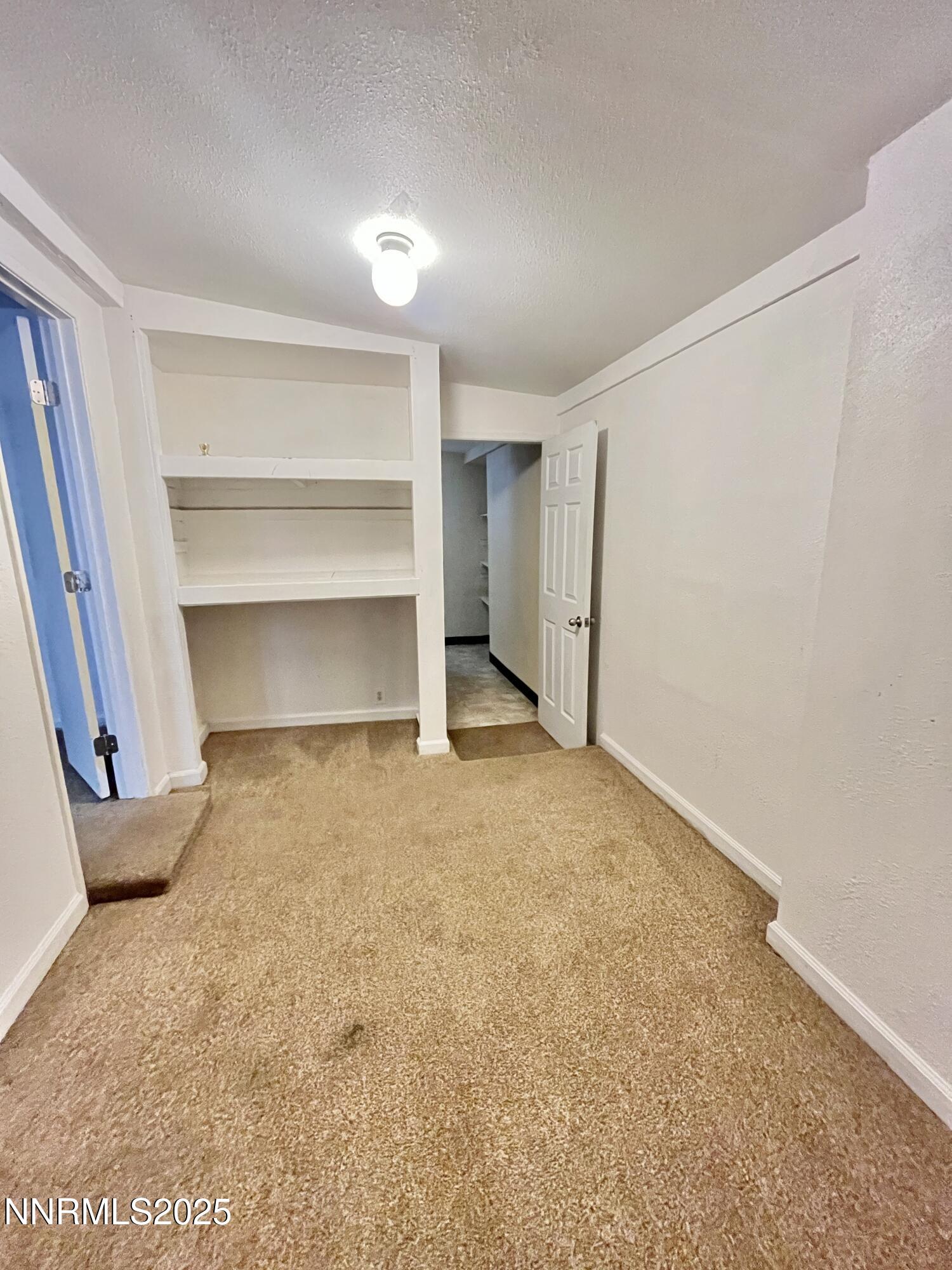 1695 Trabert Way Sparks, NV 89431 - Photo 14 of 17 a view of an empty room and a cabinet