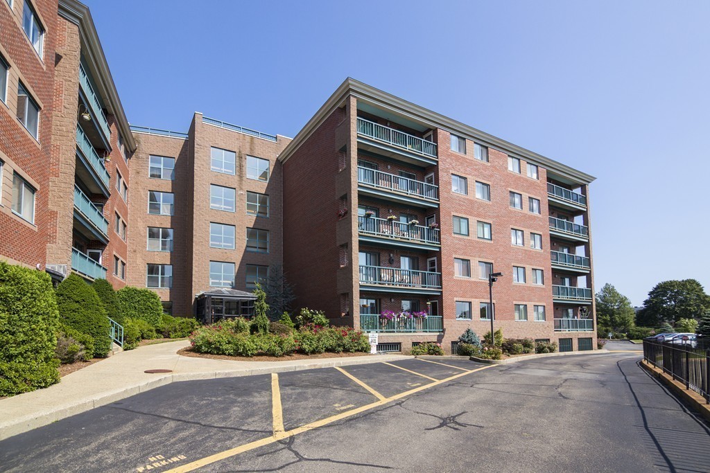 50 South Common Street, Unit 403 Lynn, MA 01902 - Photo 1 of 16 a front view of a building