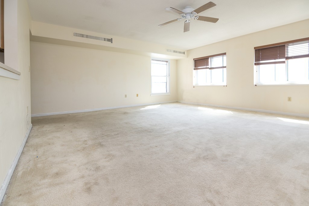 50 South Common Street, Unit 403 Lynn, MA 01902 - Photo 7 of 16 a view of an empty room with a window