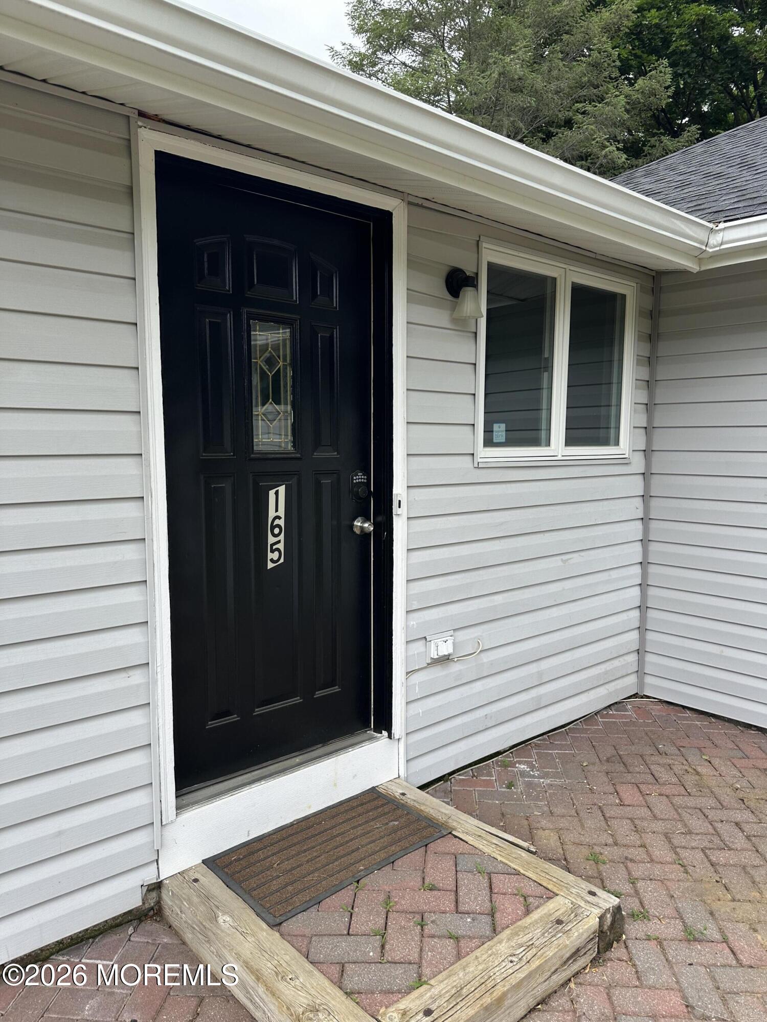 164 Everett Road, Unit 165 Lincroft, NJ 07738 - Photo 4 of 21 165 Everett Road Entrance