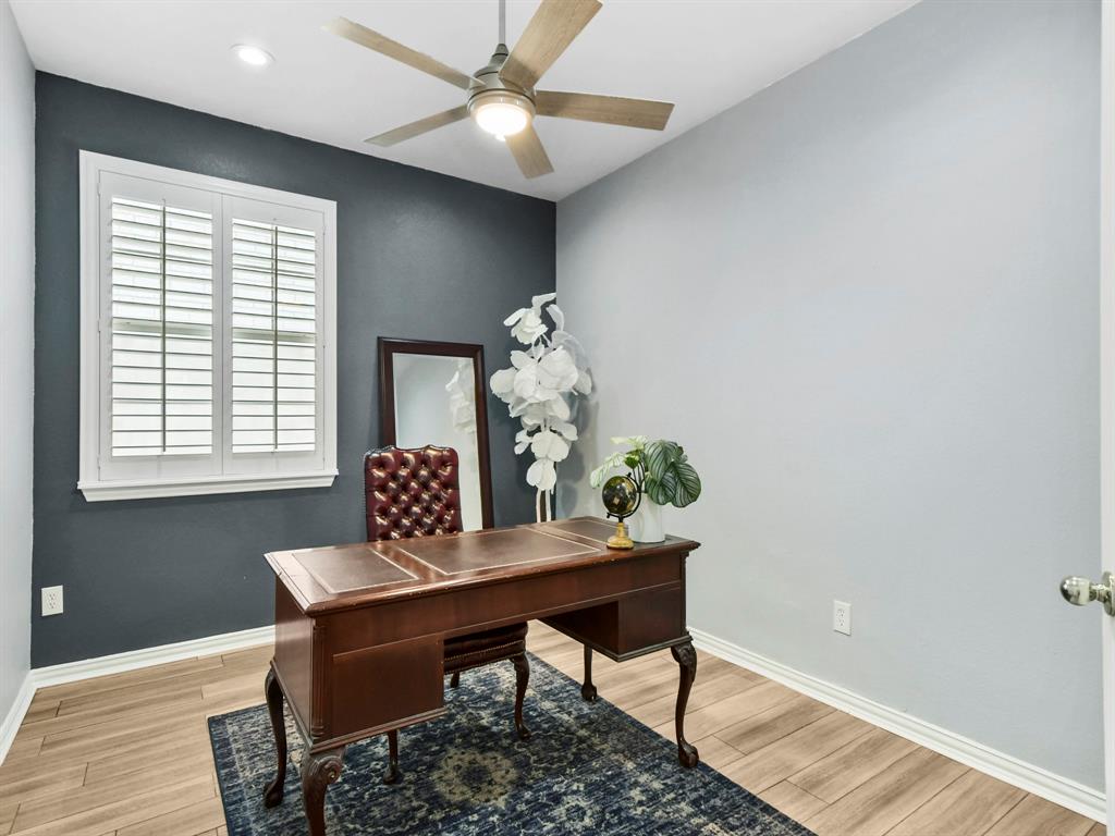 4025 Azure Lane Addison, TX 75001 - Photo 16 of 40 a living room with furniture and a window