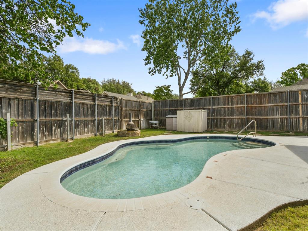 4025 Azure Lane Addison, TX 75001 - Photo 29 of 40 a view of a backyard with swimming pool