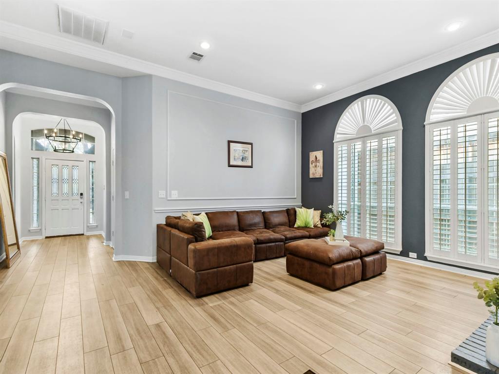 4025 Azure Lane Addison, TX 75001 - Photo 3 of 40 a living room with furniture and a large window