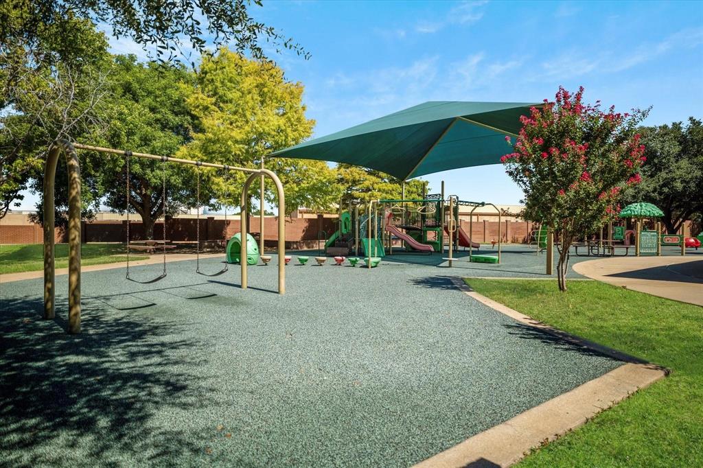 4025 Azure Lane Addison, TX 75001 - Photo 36 of 40 a view of a park with slide