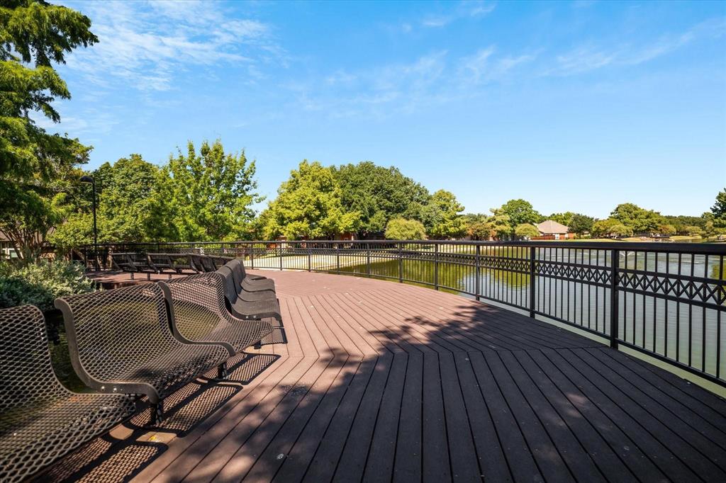 4025 Azure Lane Addison, TX 75001 - Photo 37 of 40 a view of balcony with wooden floor and outdoor seating