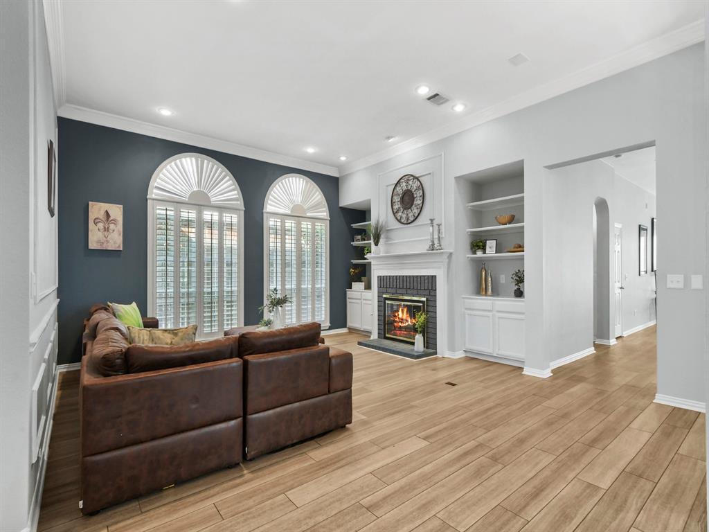4025 Azure Lane Addison, TX 75001 - Photo 5 of 40 a living room with furniture and a fireplace