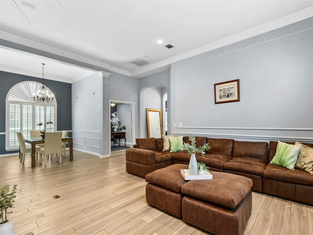 4025 Azure Lane Addison, TX 75001 - Photo 6 of 40 a living room with furniture and wooden floor