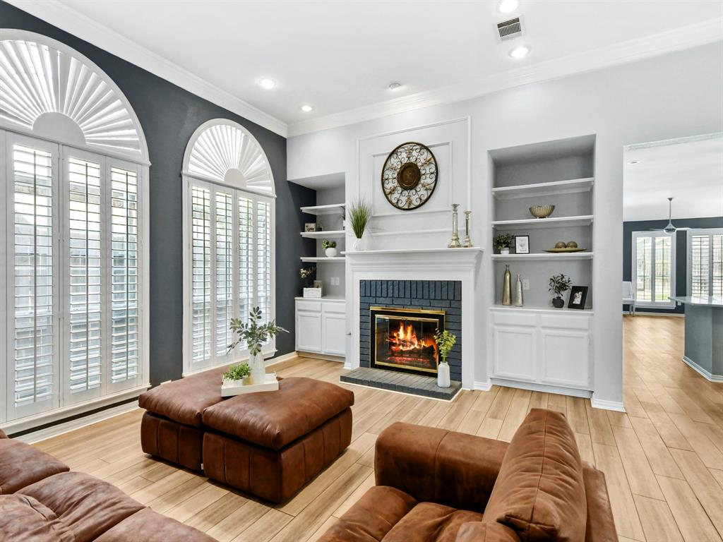 4025 Azure Lane Addison, TX 75001 - Photo 7 of 40 a living room with furniture and a fireplace