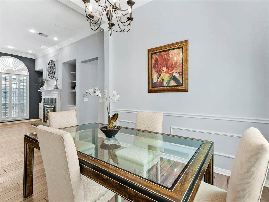4025 Azure Lane Addison, TX 75001 - Photo 10 of 40 a view of a dining room with furniture and chandelier
