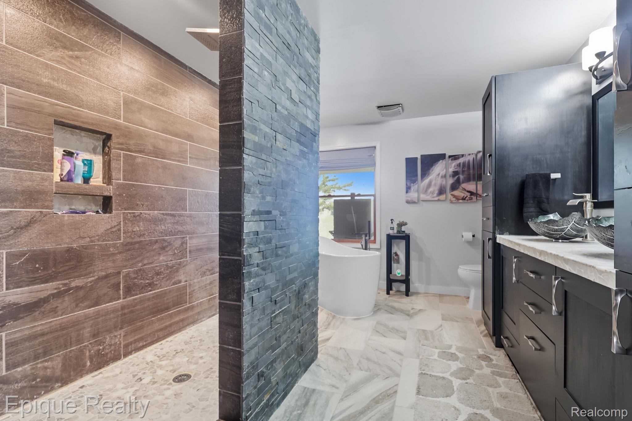 13265 Tibbets Road Memphis, MI 48041 - Photo 22 of 48 Bathroom with a soaking tub, double vanity, and a walk in shower