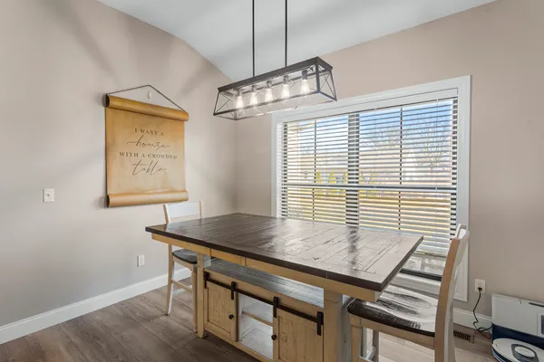 a view of a workspace with furniture