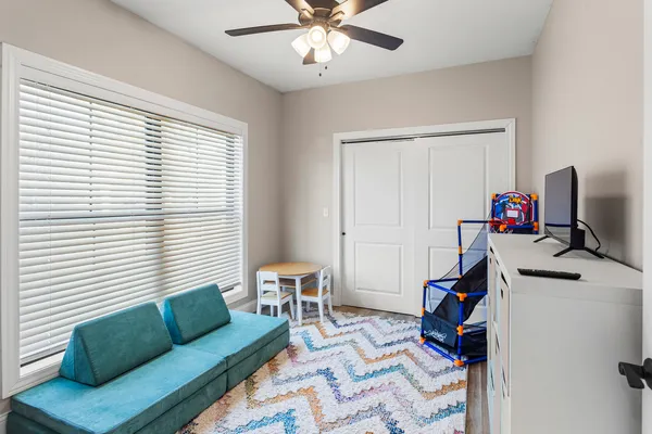 a workspace with furniture and a window