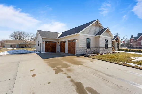 a view of a house with a yard