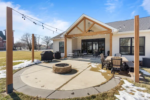 a view of a house with backyard porch and patio