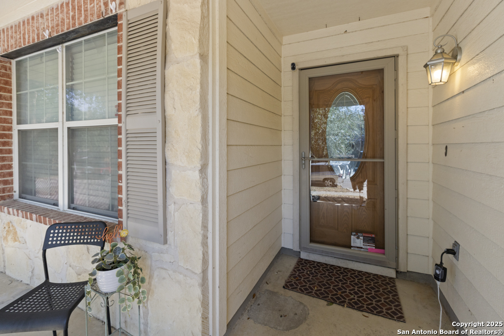 5109 Brookline Schertz, TX 78108 - Photo 2 of 35 a view of a hallway with a door and a window