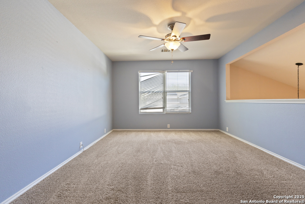 5109 Brookline Schertz, TX 78108 - Photo 21 of 35 an empty room with windows and fan