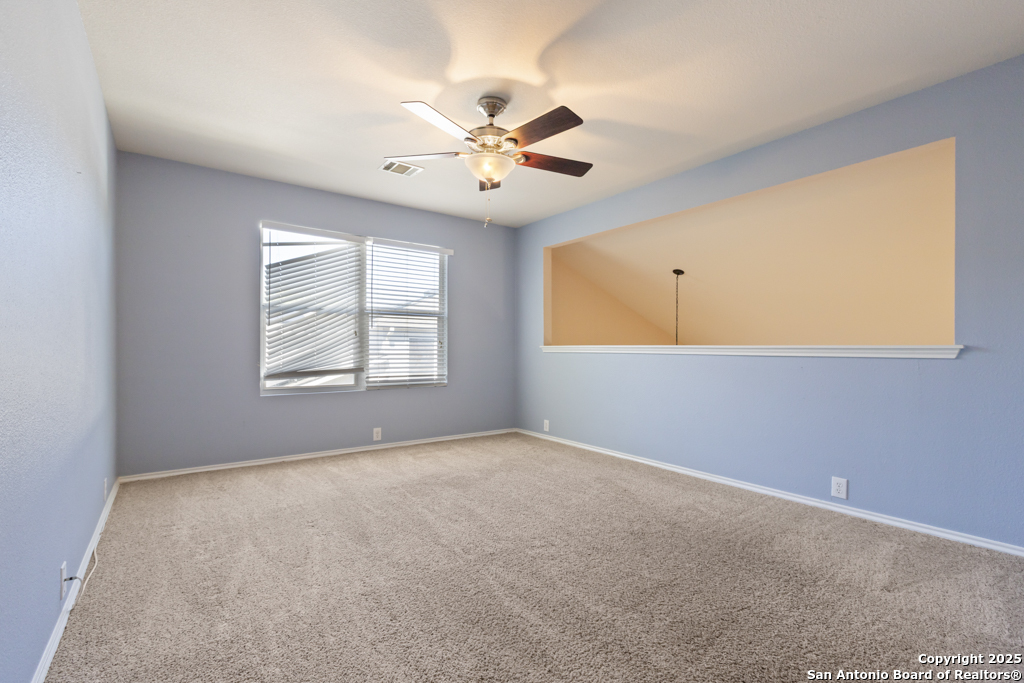 5109 Brookline Schertz, TX 78108 - Photo 22 of 35 an empty room with windows and fan
