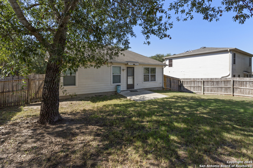 5109 Brookline Schertz, TX 78108 - Photo 33 of 35 a view of a house with a tree in a yard