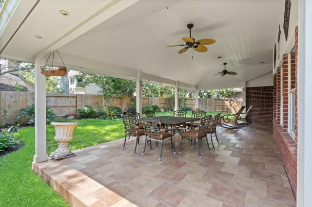a living room with patio furniture