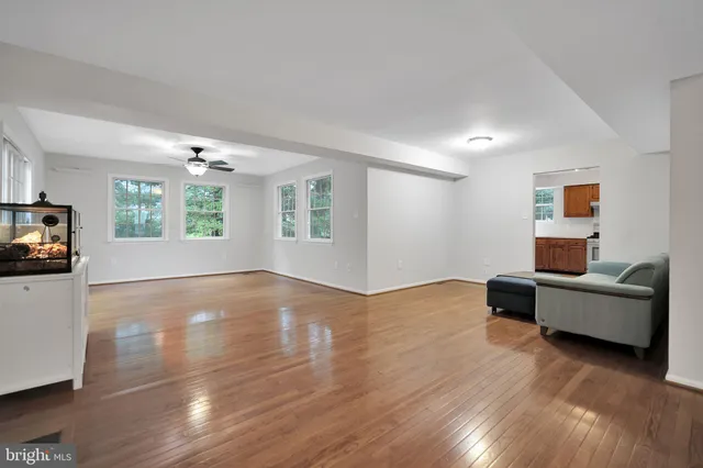 a view of a livingroom with furniture and wooden floor