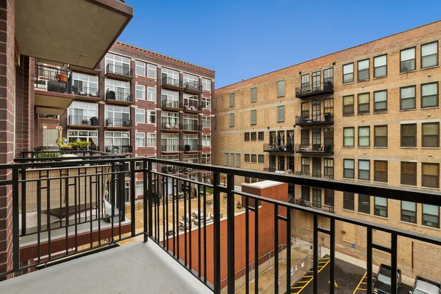 a view of a building from a balcony