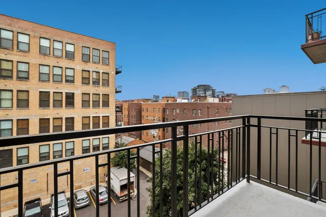 a view of a building from a balcony