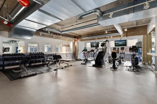 a view of a workspace with furniture