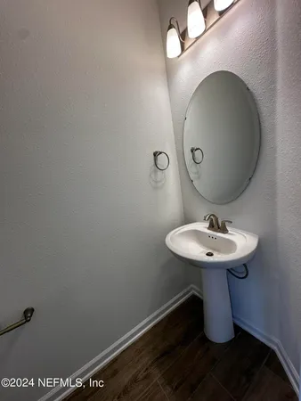 a bathroom with a sink and a toilet
