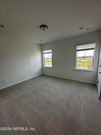 a view of a livingroom with a staircase