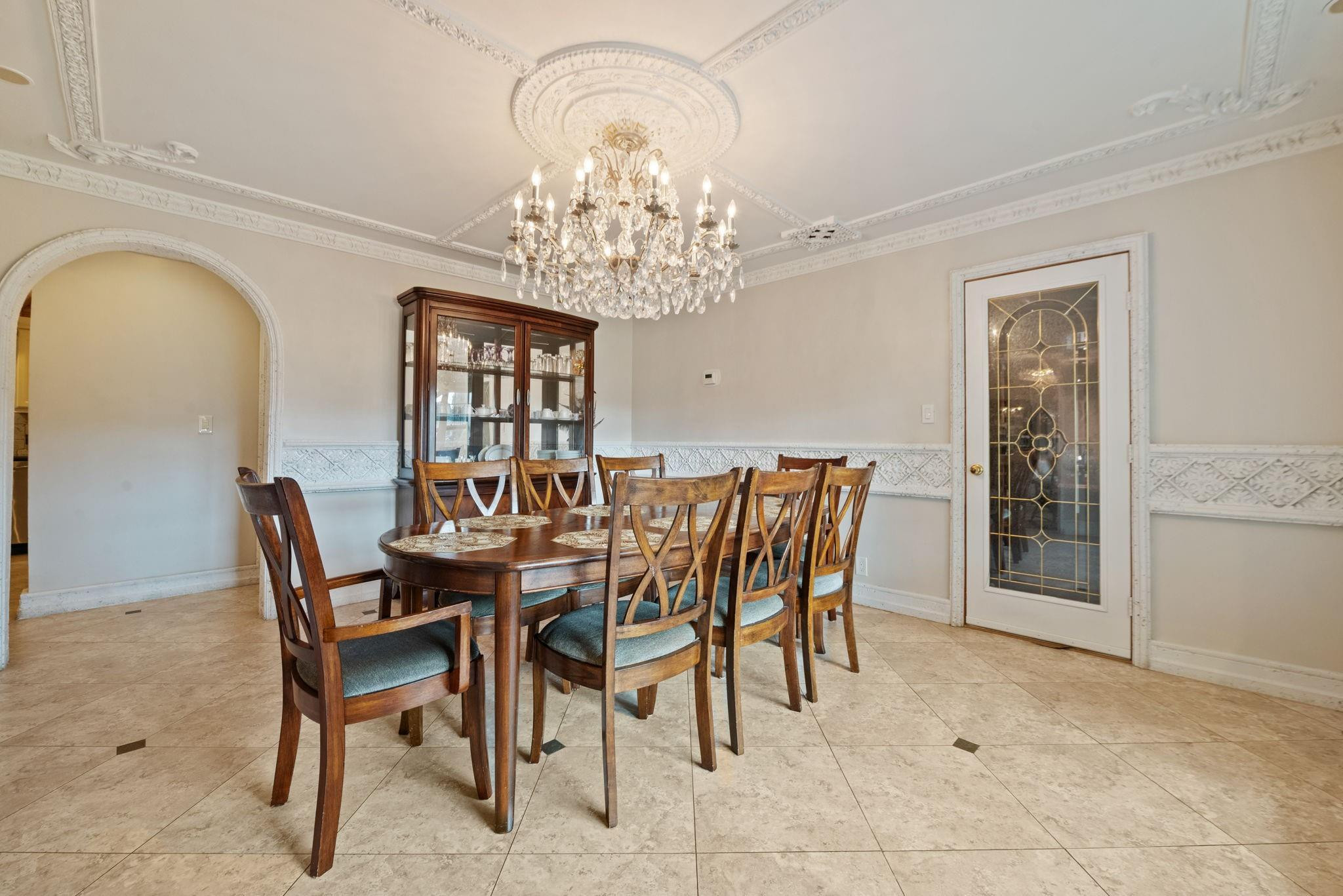 17501 Southwest 54th Street Southwest Ranches, FL 33331 - Photo 13 of 39 a dining room with furniture and chandelier
