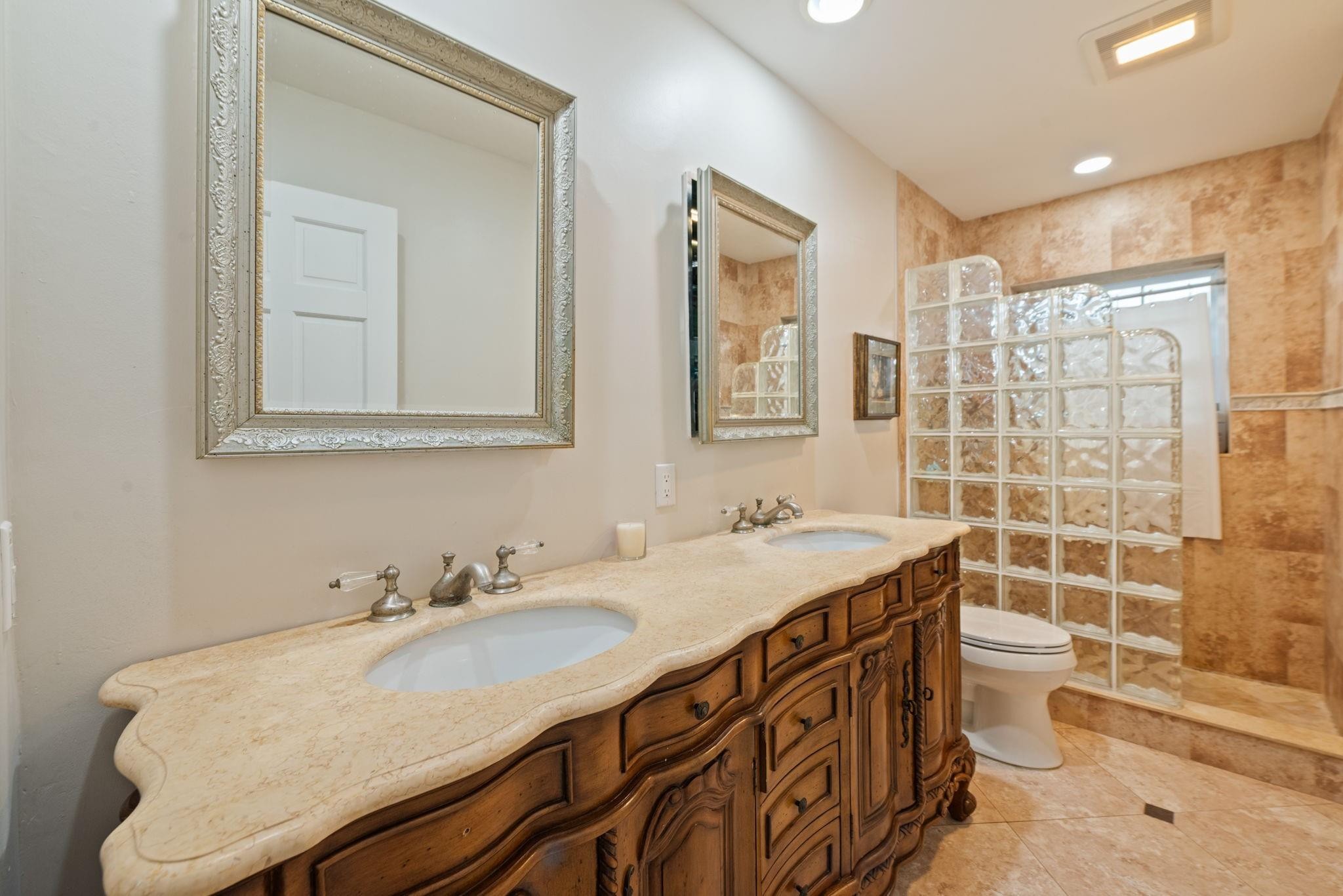 17501 Southwest 54th Street Southwest Ranches, FL 33331 - Photo 23 of 39 a bathroom with a sink and a mirror