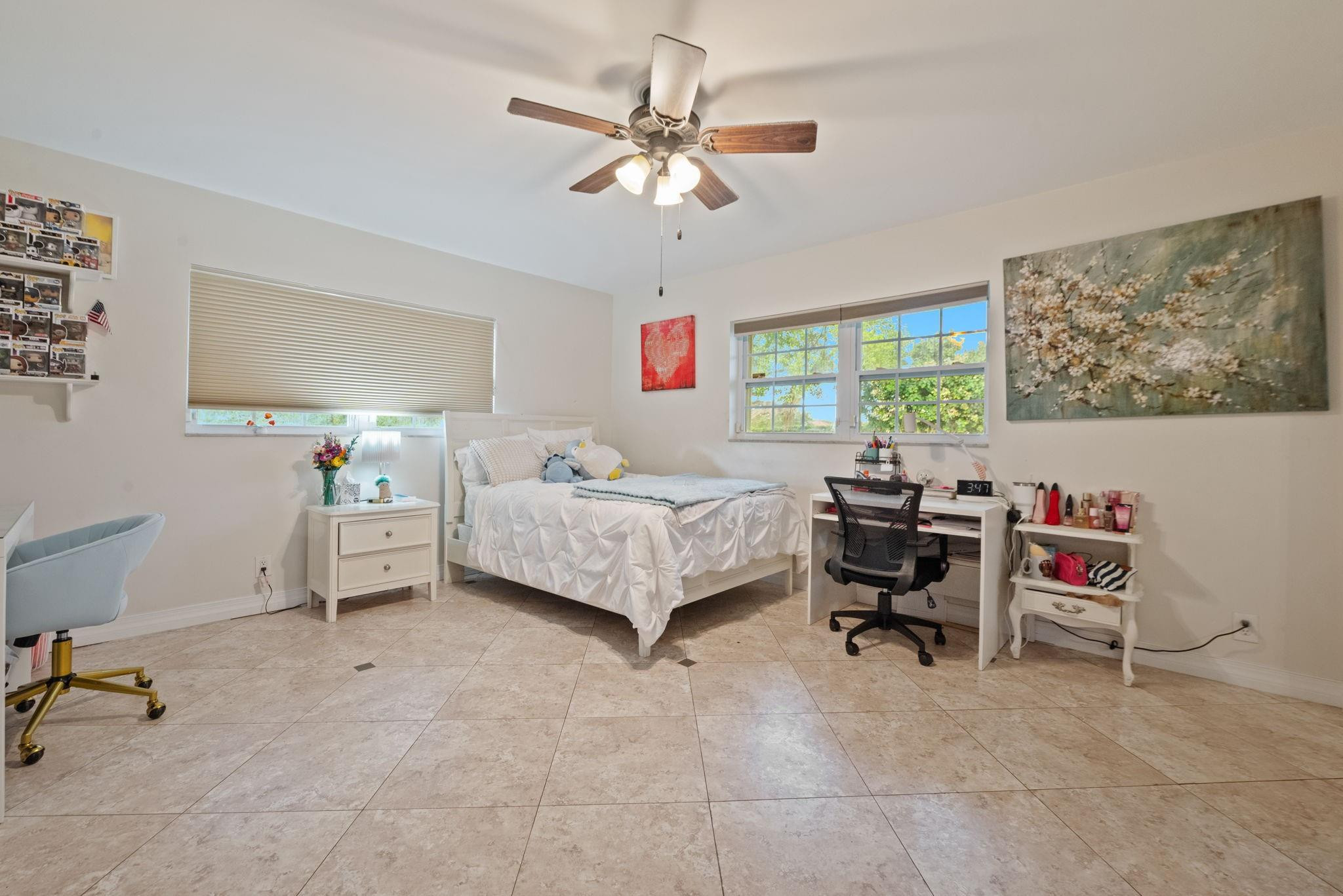 17501 Southwest 54th Street Southwest Ranches, FL 33331 - Photo 25 of 39 a bed room with a bed and a chair