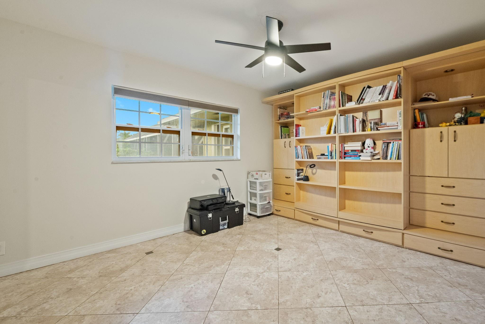 17501 Southwest 54th Street Southwest Ranches, FL 33331 - Photo 26 of 39 a living room with hard wood floors and a window