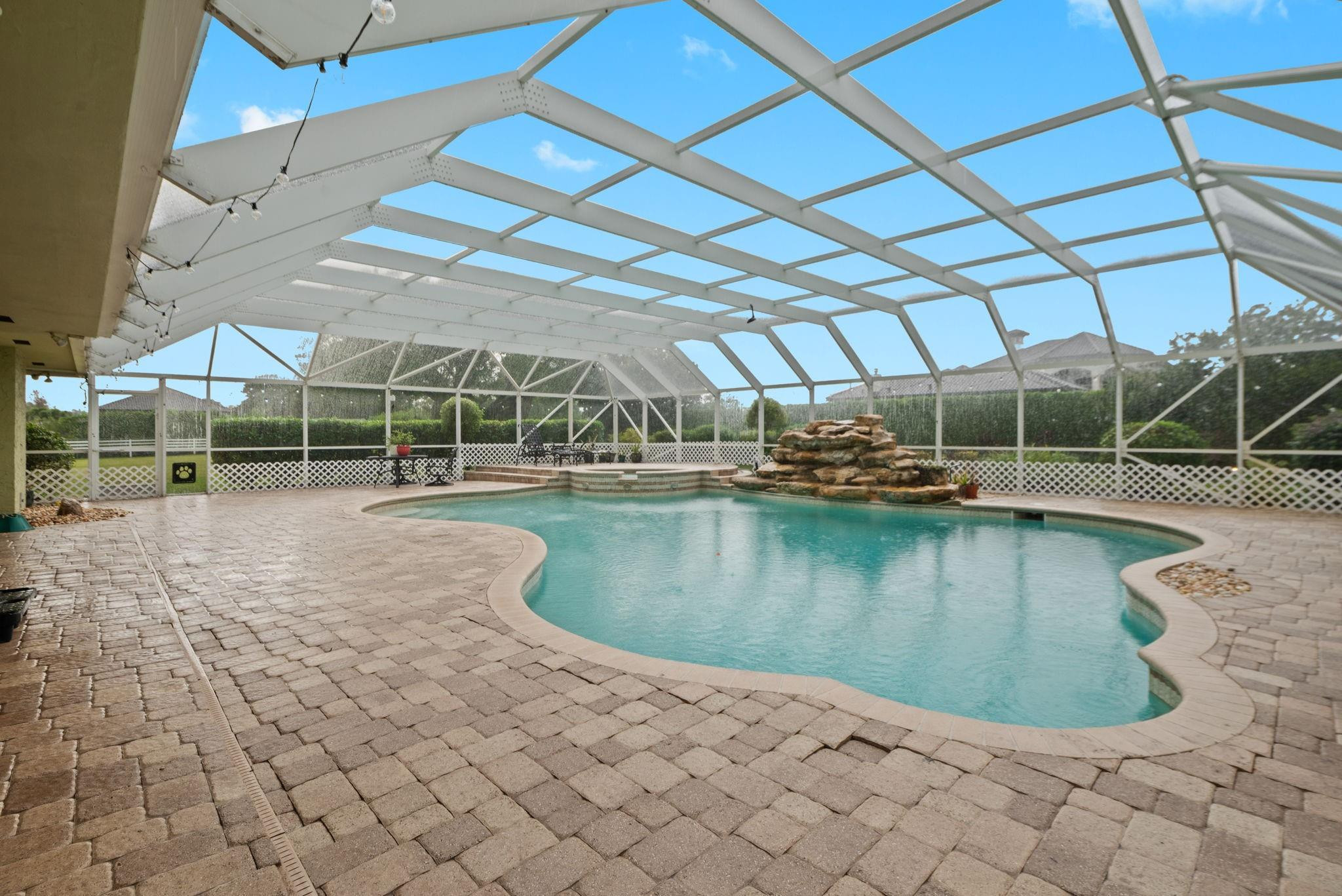 17501 Southwest 54th Street Southwest Ranches, FL 33331 - Photo 35 of 39 a view of a swimming pool with a yard