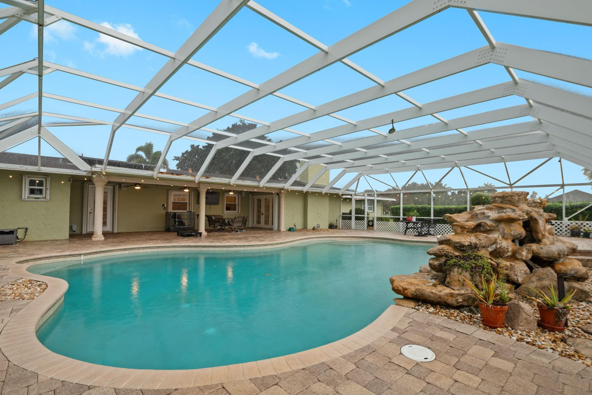 17501 Southwest 54th Street Southwest Ranches, FL 33331 - Photo 36 of 39 a view of a swimming pool with a patio